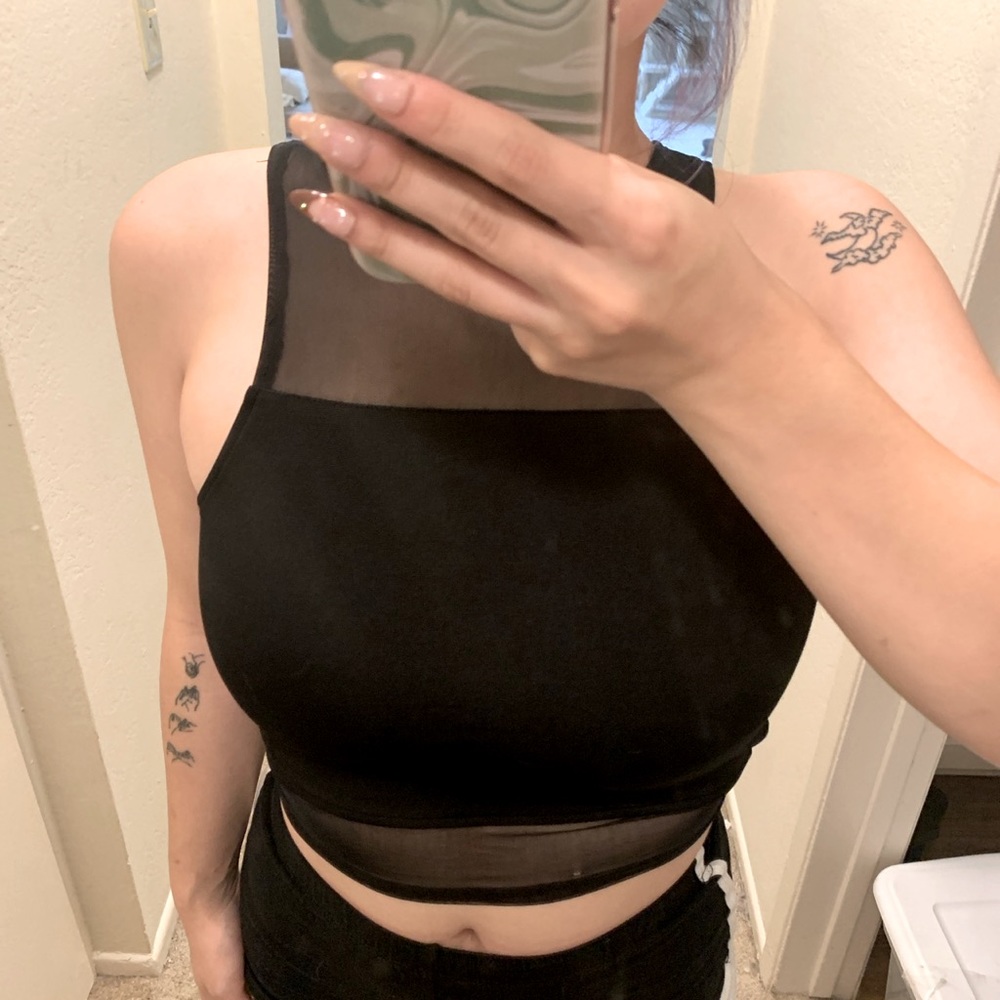 H&M black cropped halter top with mesh lining on top and bottom